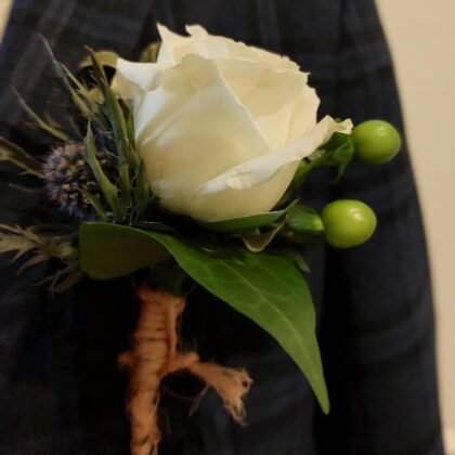 Timeless Rose & Hypericum Buttonhole