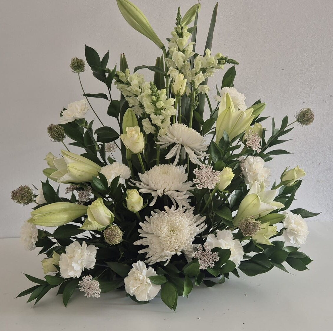 Elegant White & Ivory Funeral Spray – A Graceful Tribute of Remembrance - Image 3